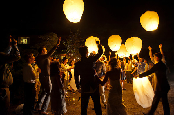 Floating lanterns at a wedding